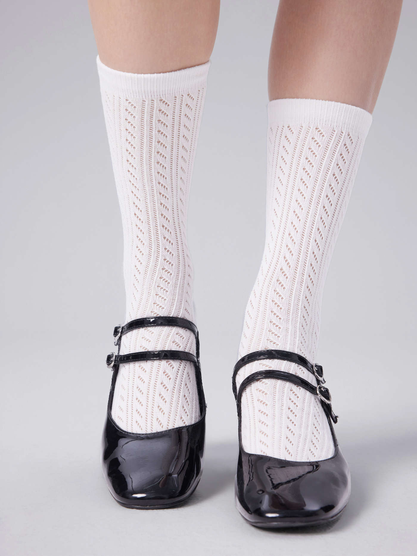 SOLID HOLLOW OUT OVER THE CALF SOCKS