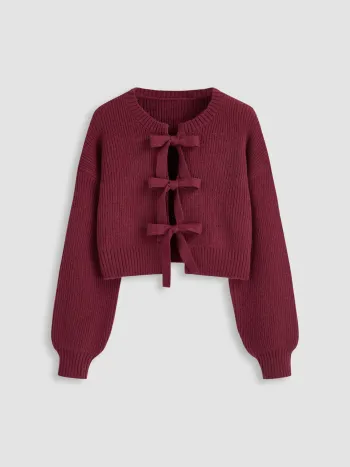 Strickjacke mit Rundhals, einfarbig und Bauschopf an der Front