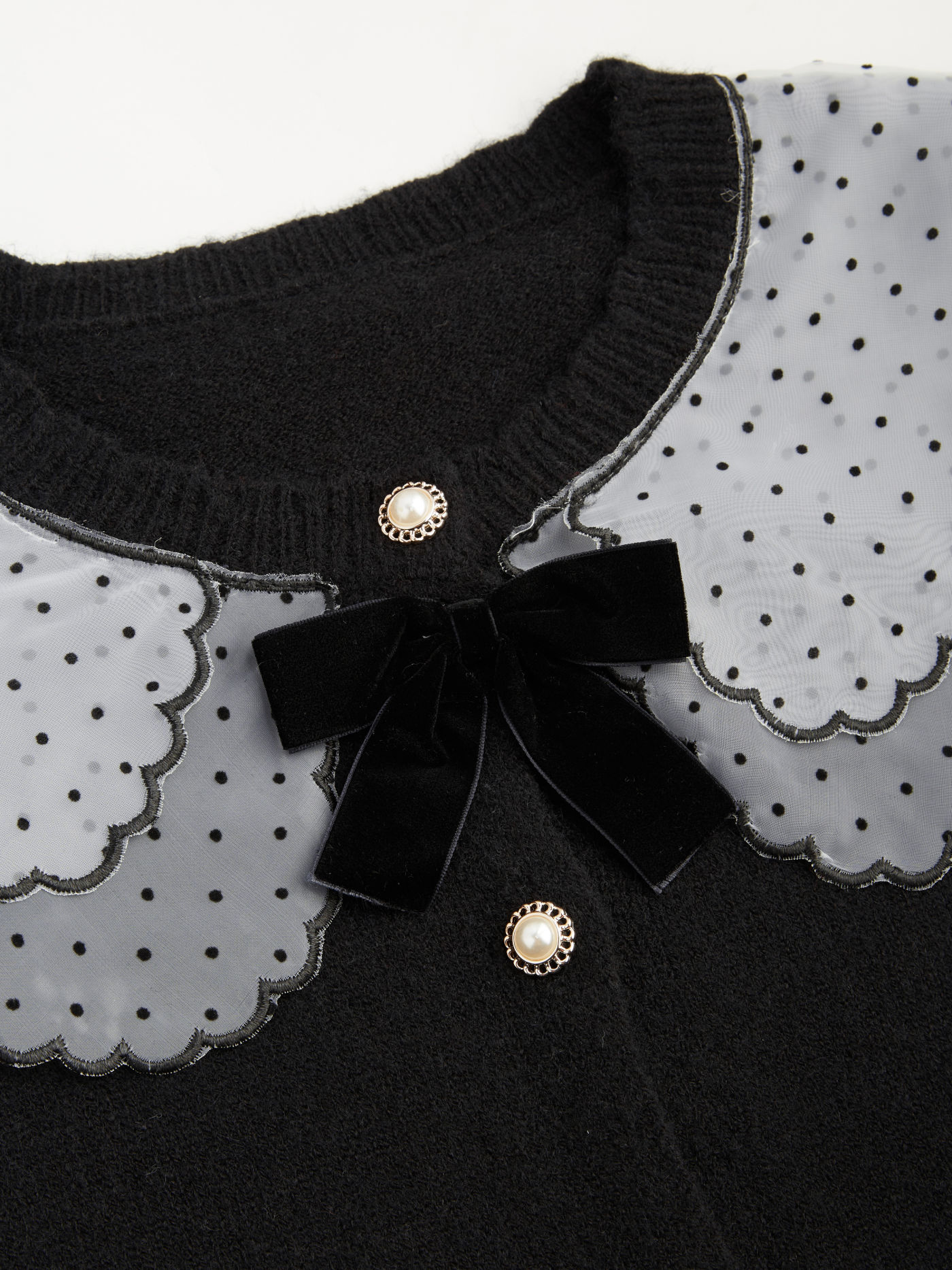 Cardigan à pois nœud col rond en maille