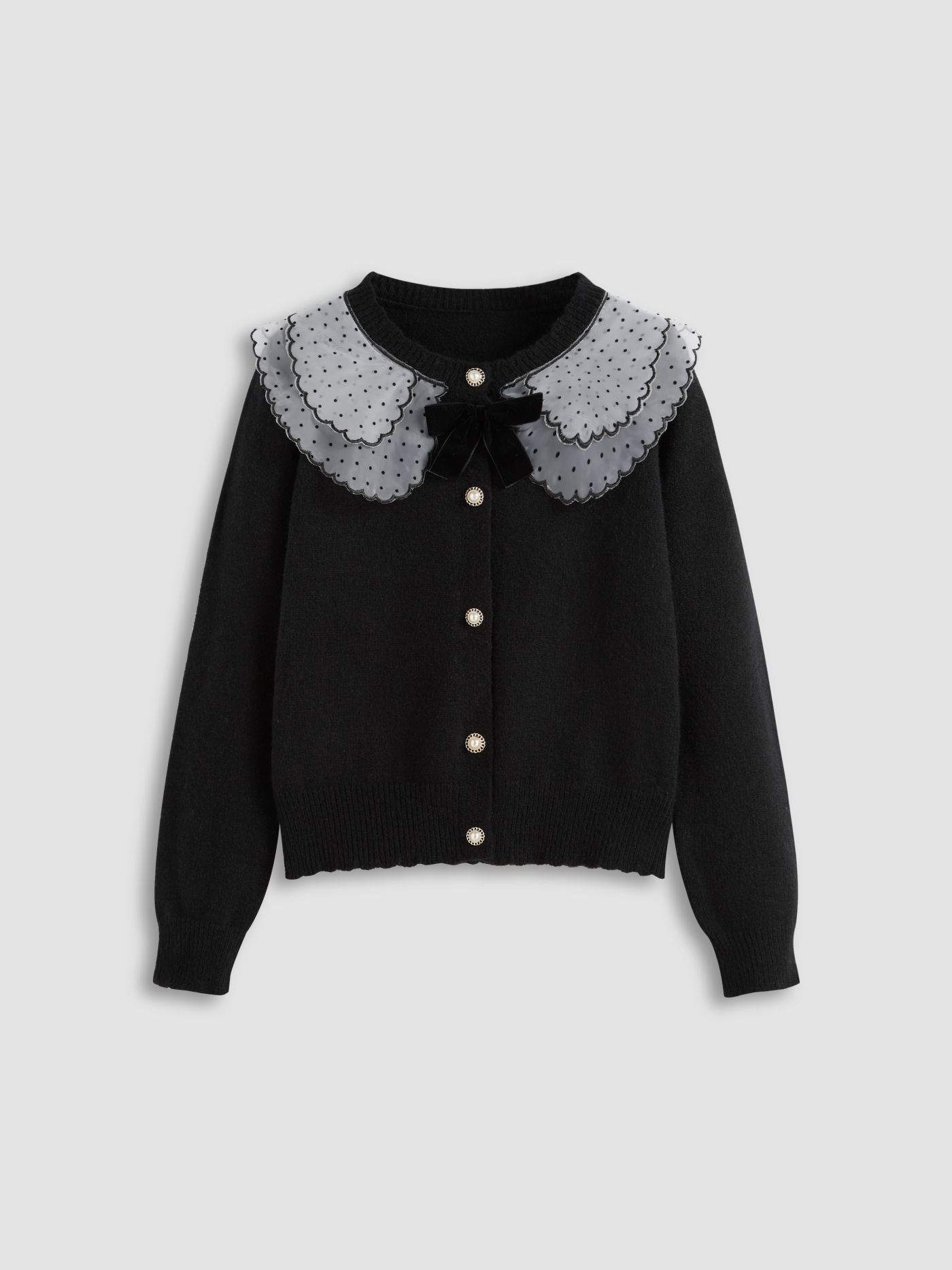 Cardigan à pois nœud col rond en maille