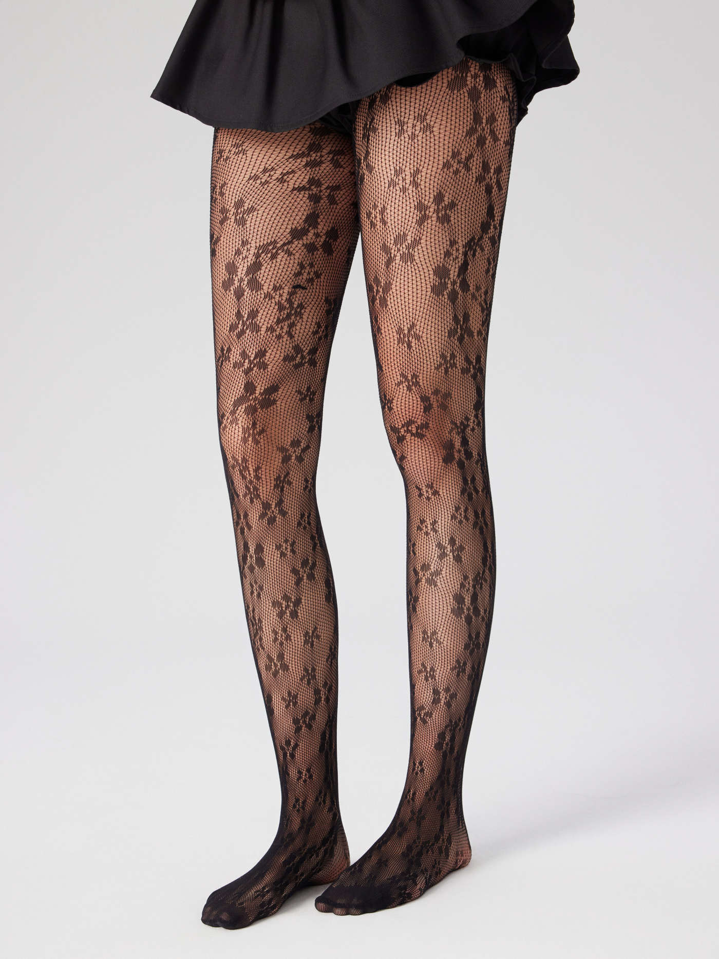 FLORAL FISHNET TIGHTS