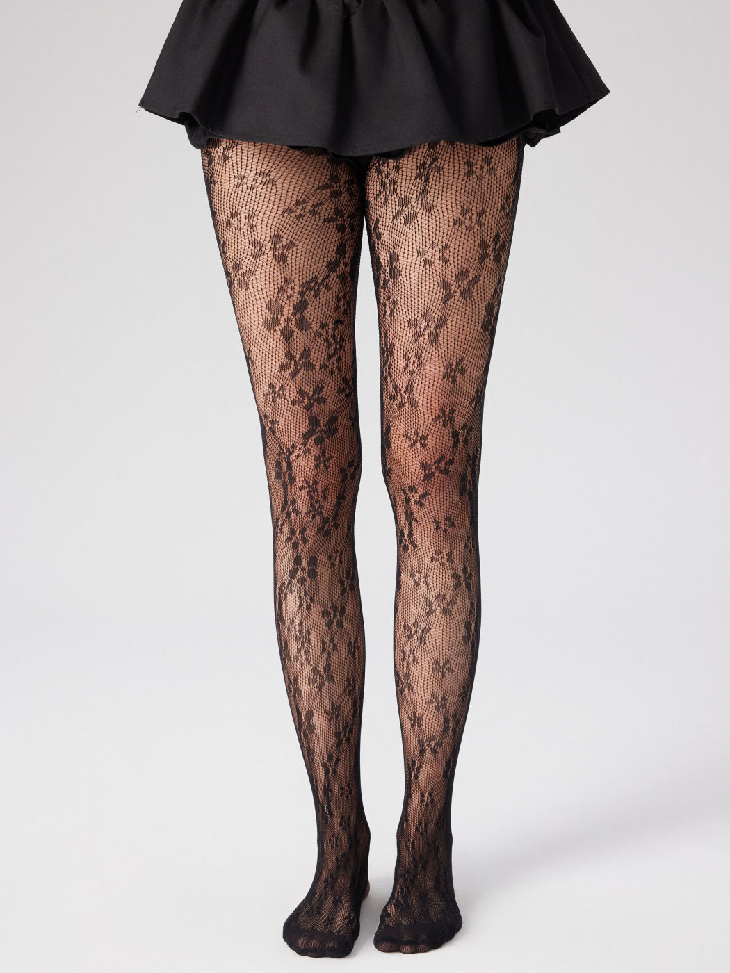 FLORAL FISHNET TIGHTS