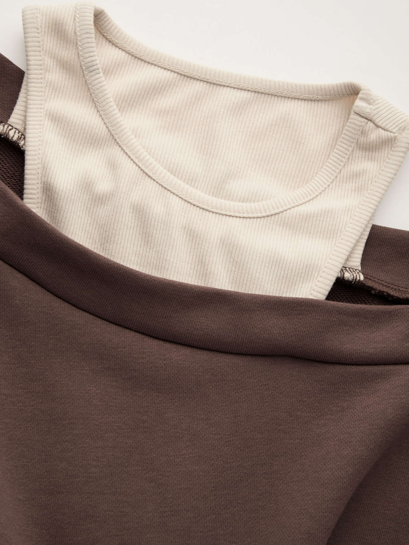 ラウンドネックアシンメトリーフリルヘムミニドレス