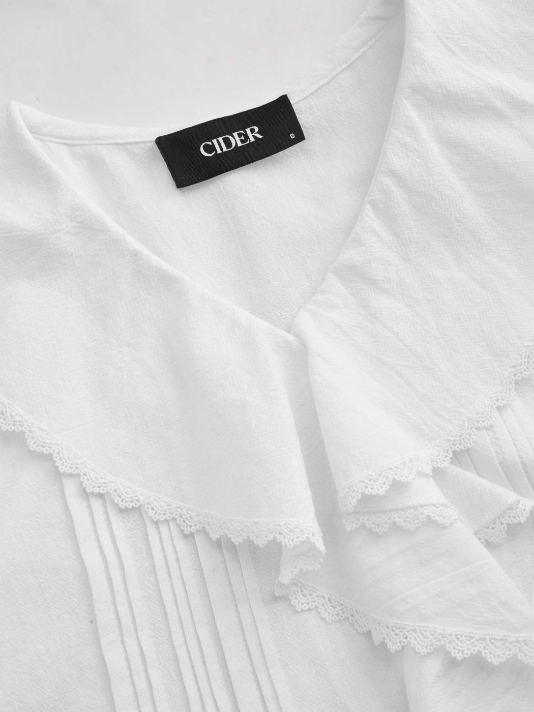 100% Cotton V-neck Ruffle Hem Pleated Long Sleeve Blouse