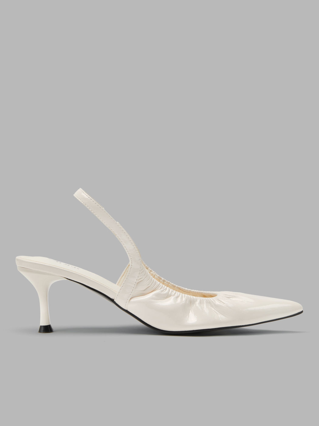 TACCHI A PUNTA SLINGBACK