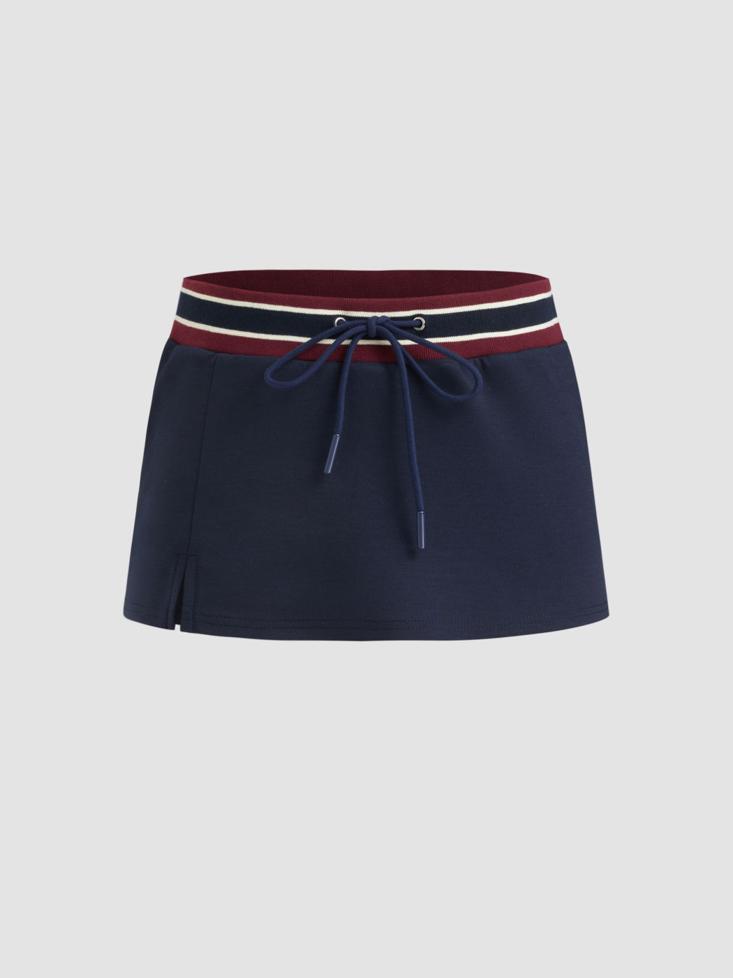 Mittelhohe Mikro-Mini-Skirt mit Kontrastborten und Schlitz