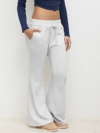 Pantaloni da tuta svasati a vita bassa