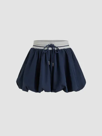 Mid Rise Knotted Bubble Hem Mini Skirt