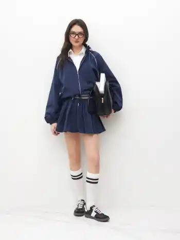 Mid Rise Knotted Bubble Hem Mini Skirt