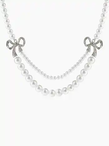 Collier à double couche avec noeud en rhinocéros et faux perles
