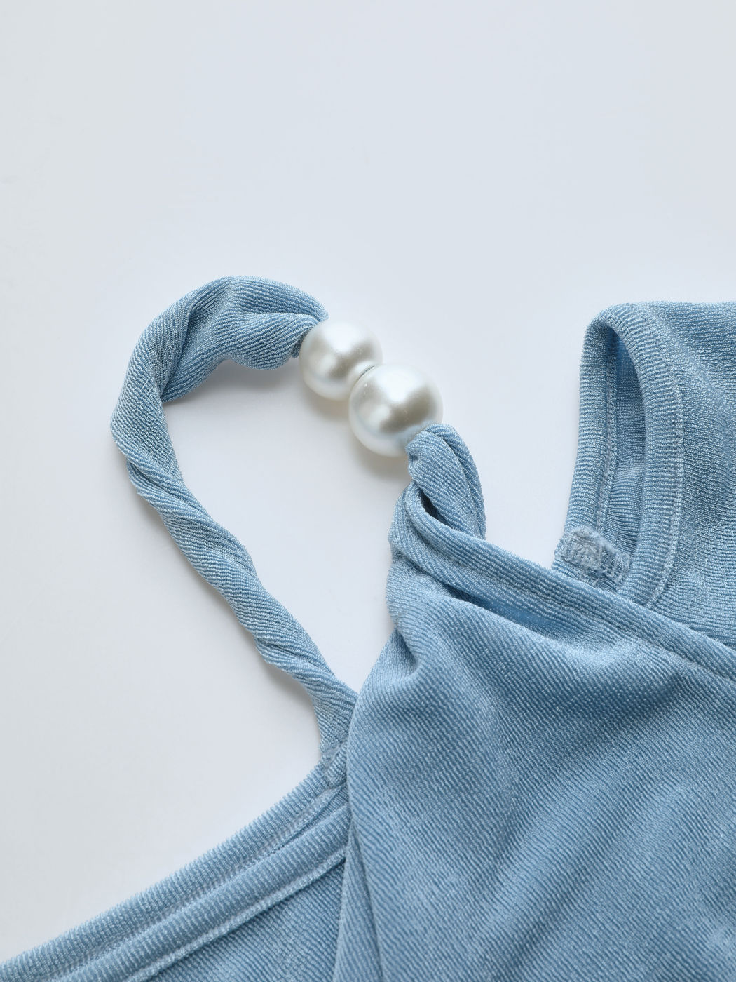Asymmetrical Neck Pearl Twist Top