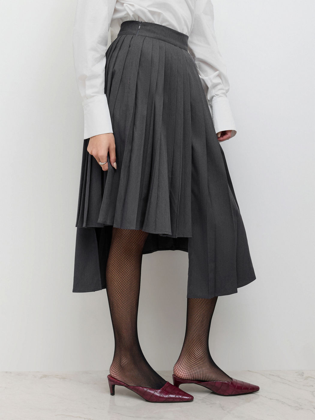 Mid Rise Pleated Asymmetrical Hem Midi Skirt