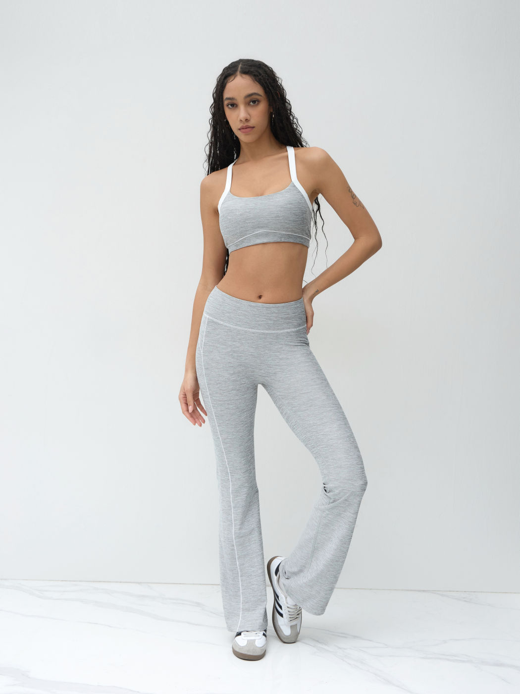 Scoop Neckline Contrasting Binding Criss Cross Active Bra & Low Rise Constrast Binding Flared Active Trousers Set With Removable Padding