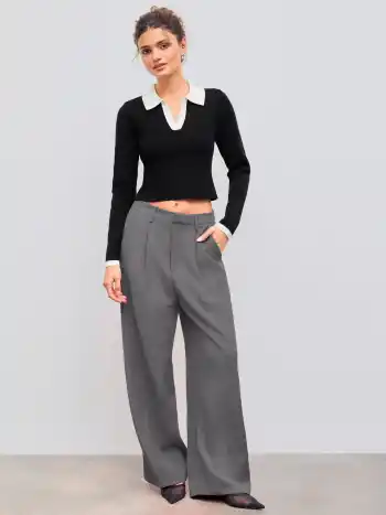 Mittelhohe einfarbige Hose mit Taschen und geraden Beinen
