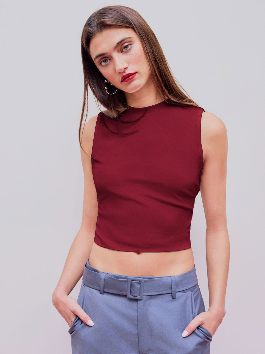 Rundhalsiges einfarbiges ärmelloses geriffeltes Crop Top