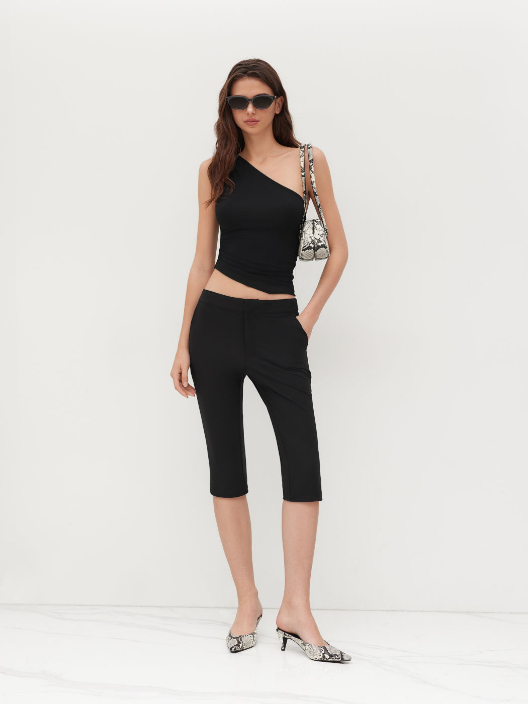 Pantalones Capri Ajustados de Bajo Cinturón con Bolsillos