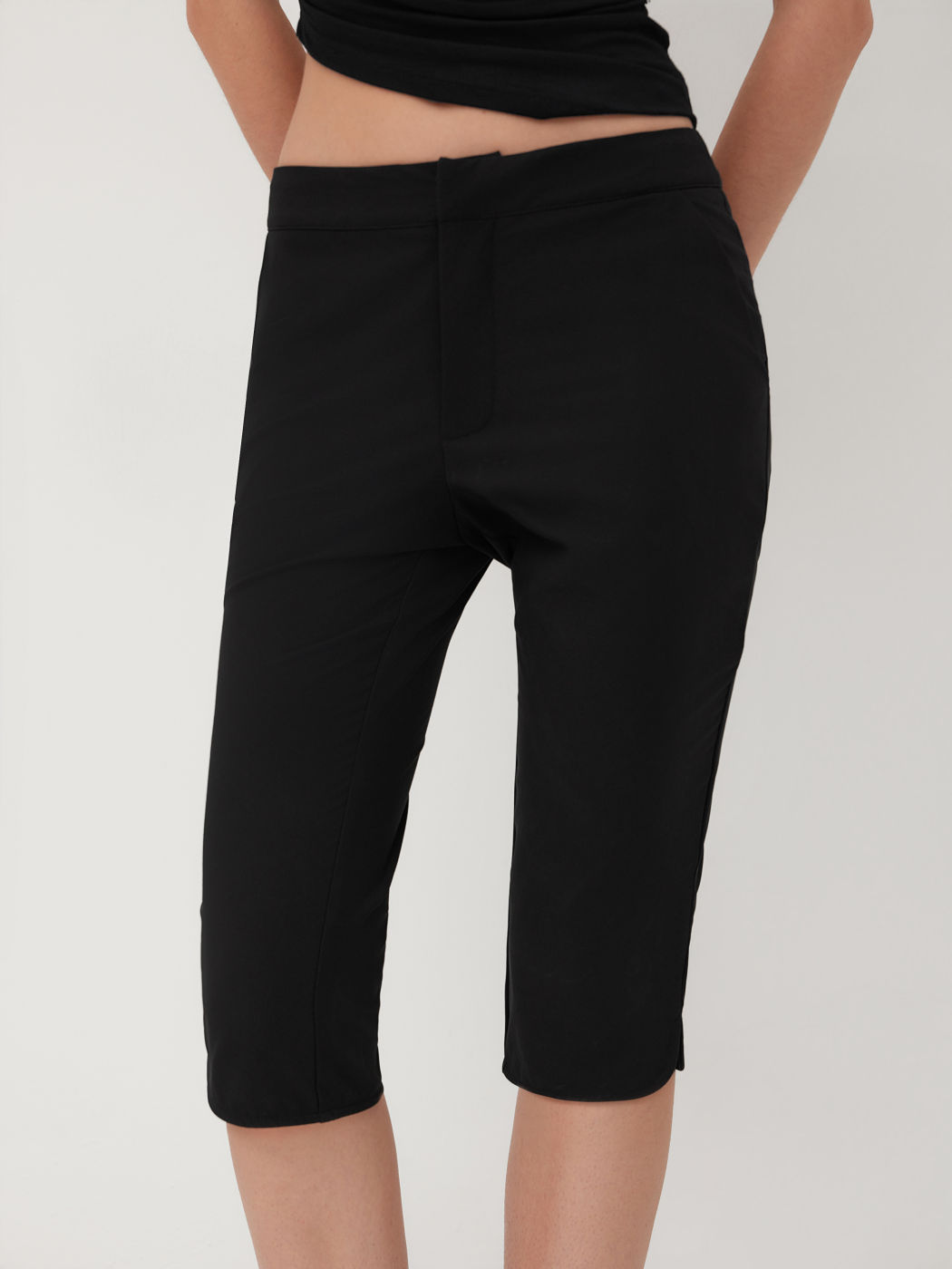 Pantalones Capri Ajustados de Bajo Cinturón con Bolsillos