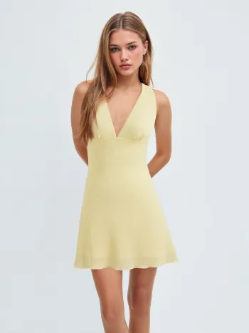 Mini-Kleid mit Halterhalsrand und geknüpftem Salatrand
