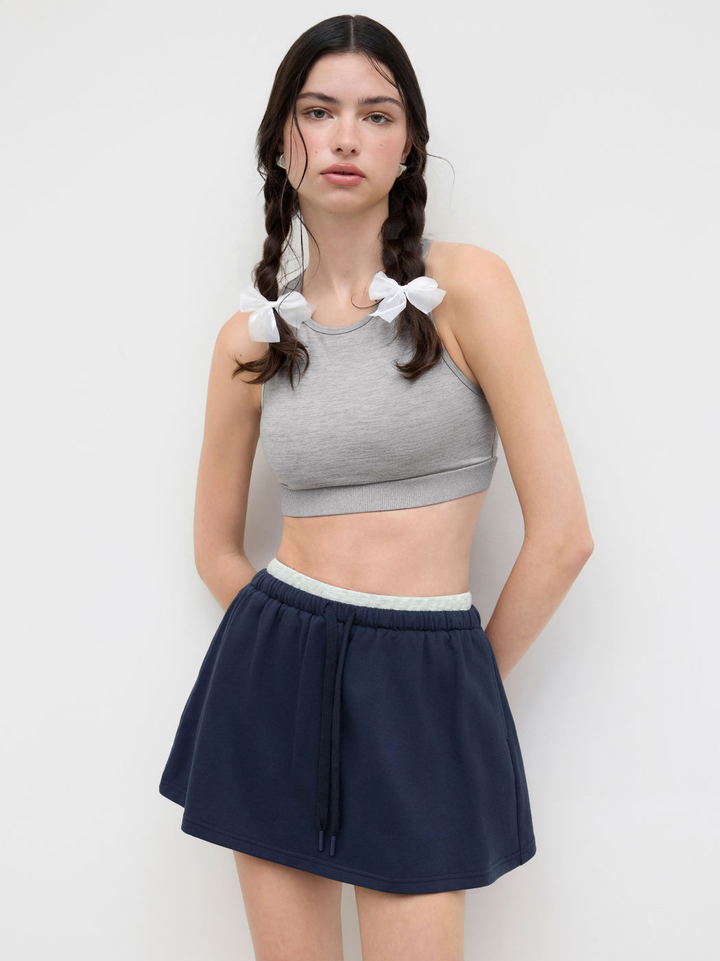 Mini gonna-pantalone a vita media in misto cotone con fiocco annodato sul davanti