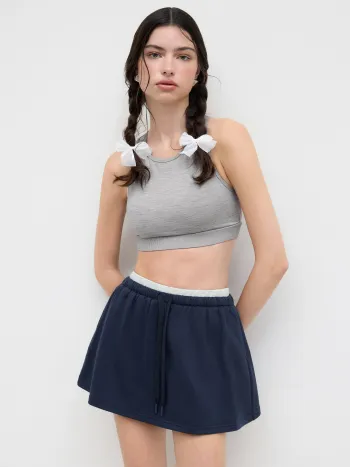 Mini-Skort aus Baumwollmischung mit mittlerer Taille und Binde vorne