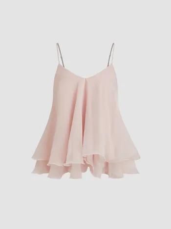 Top camiseta de malla con capas, nudos y volantes en el dobladillo