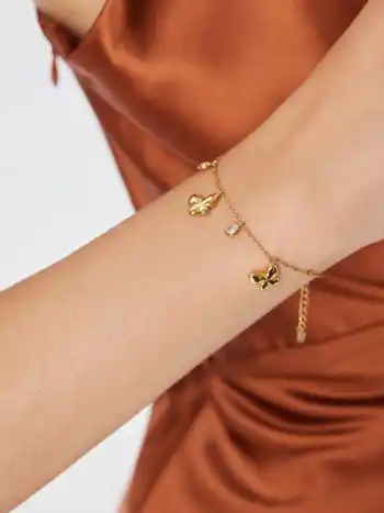 18K vergoldete, edelstahlverarbeitete Armband mit Schmetterling- und Rheinstein-Design