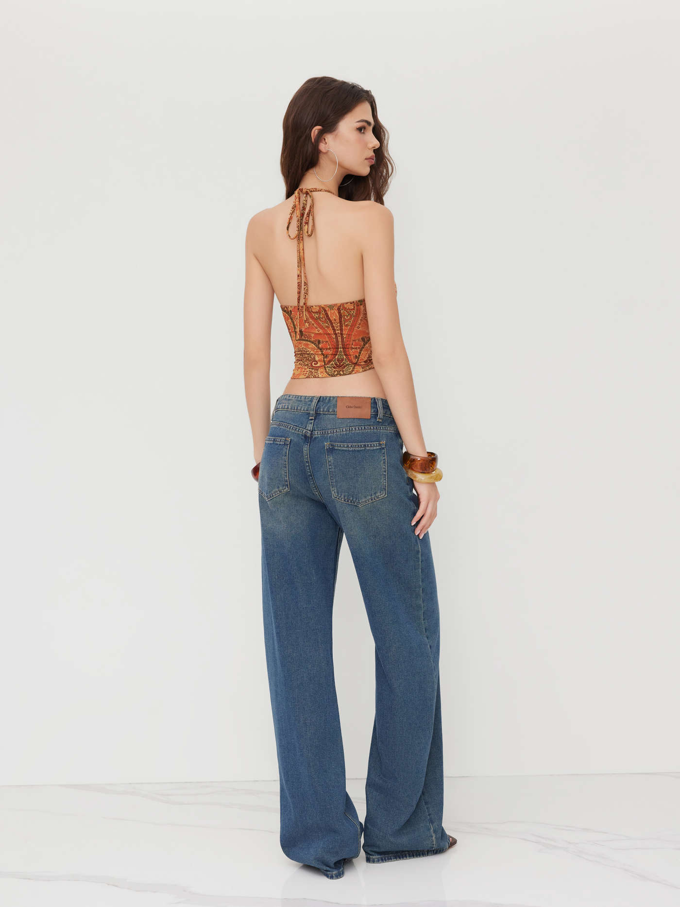 Halter Neckline Floral Asymmetrical Hem Top