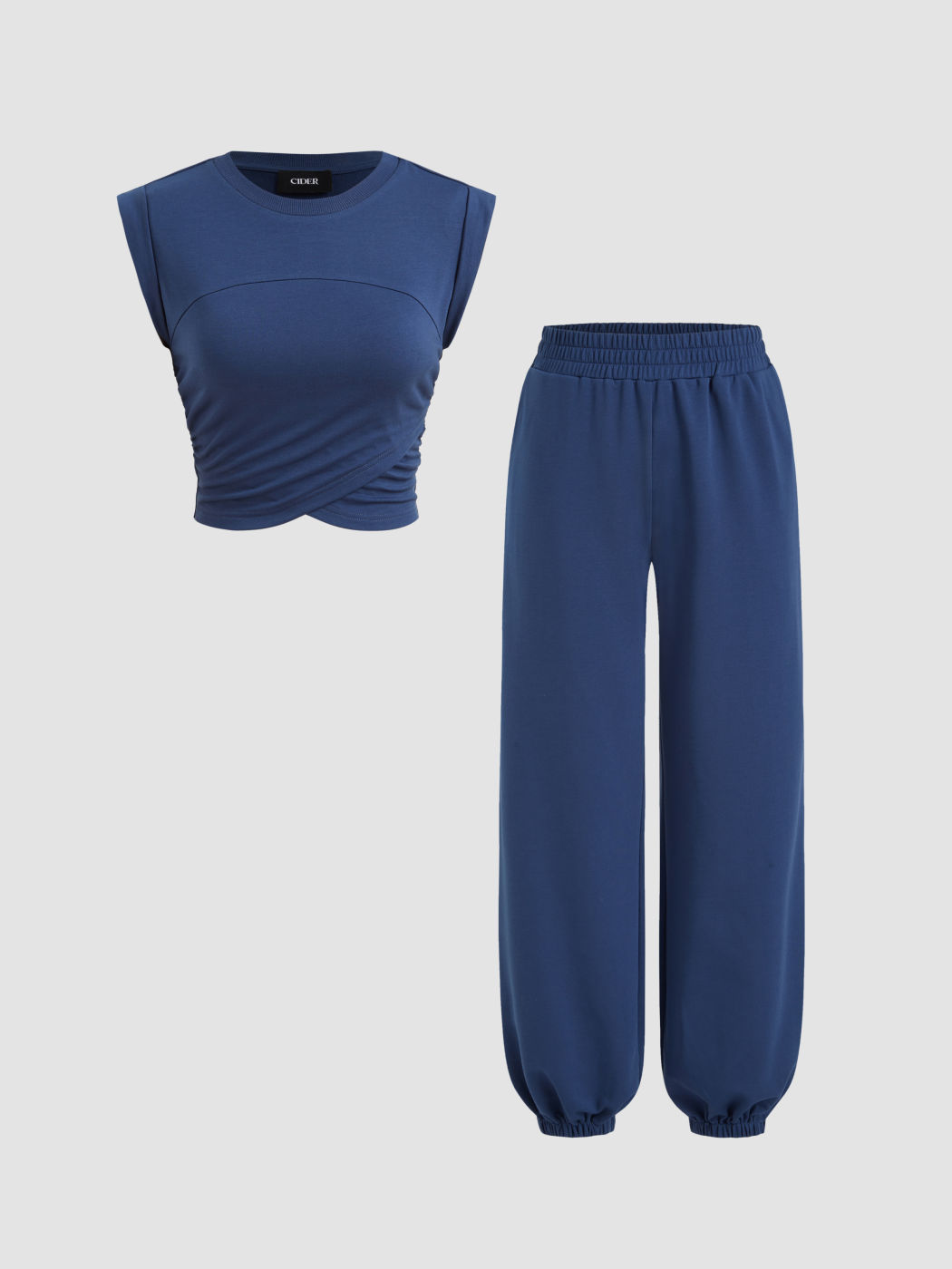 Set top corto arricciato in misto cotone e pantaloni da jogging con elastico in vita a vita bassa