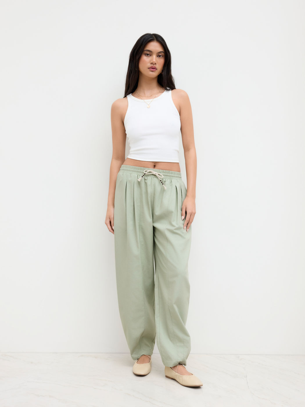 Linen-blend Mid Rise Elastic Waist Knotted Tapered Trousers