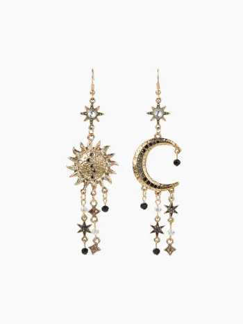 Boucles d'oreilles décorées de soleil, lune, étoiles et strass