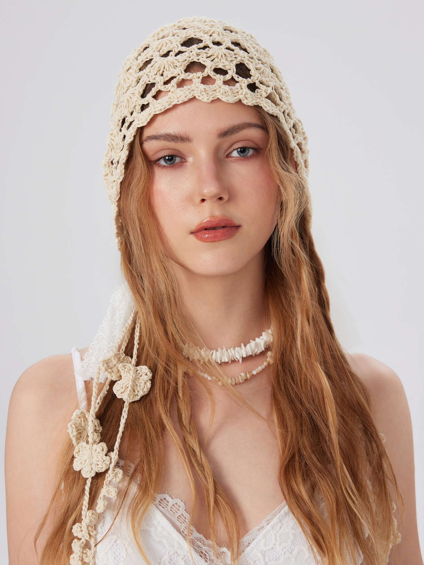 BOWKNOT & TASSEL KNITTED HAT