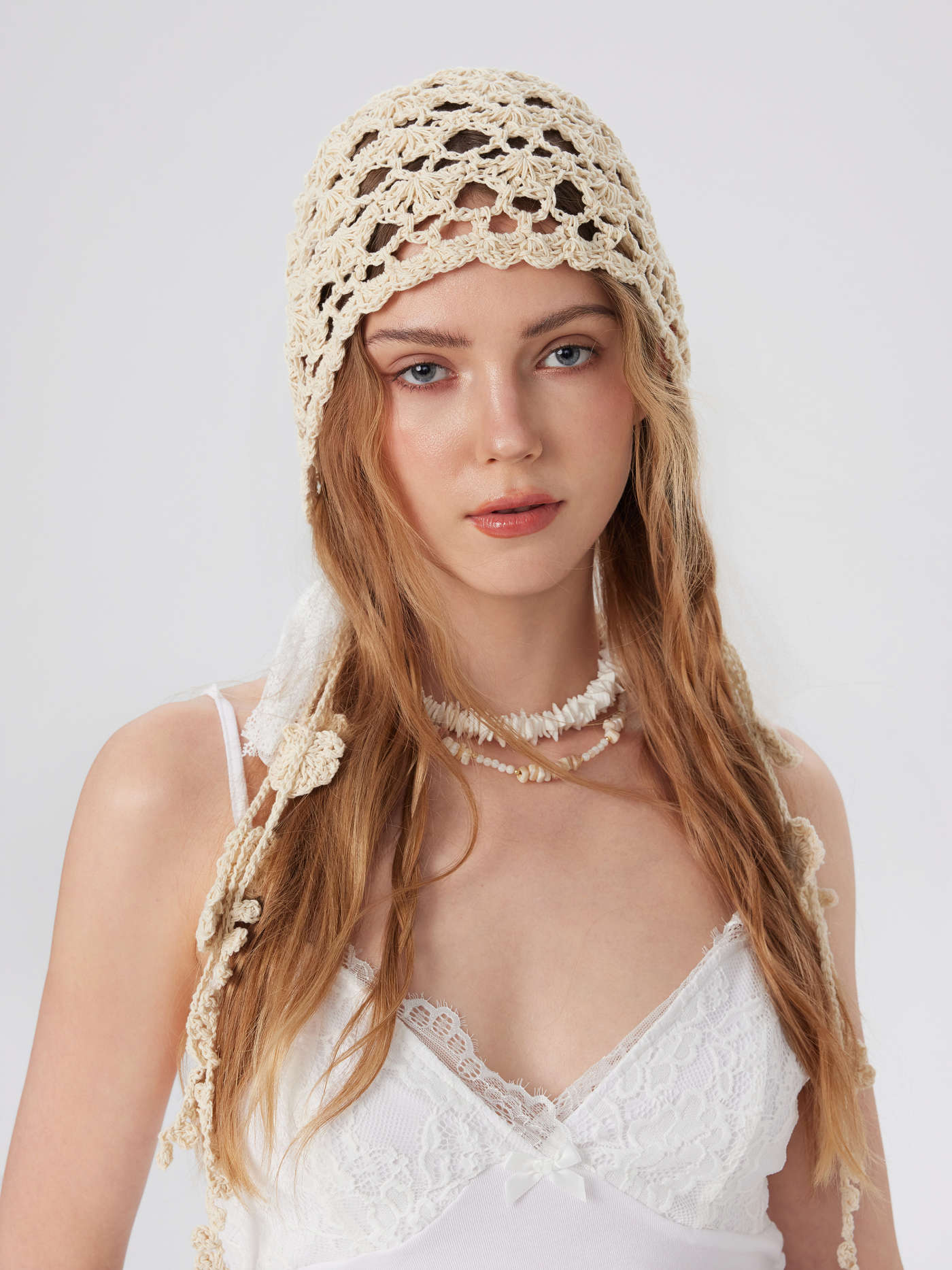BOWKNOT & TASSEL KNITTED HAT