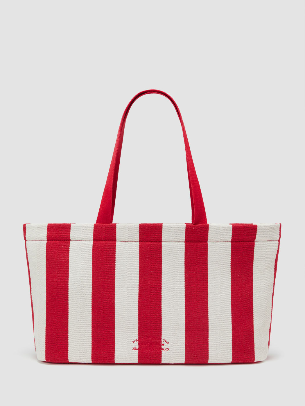 WHAT HAPPENS AT THE BEACH STAYS IN THE SAND STRIPED TOTE BAG