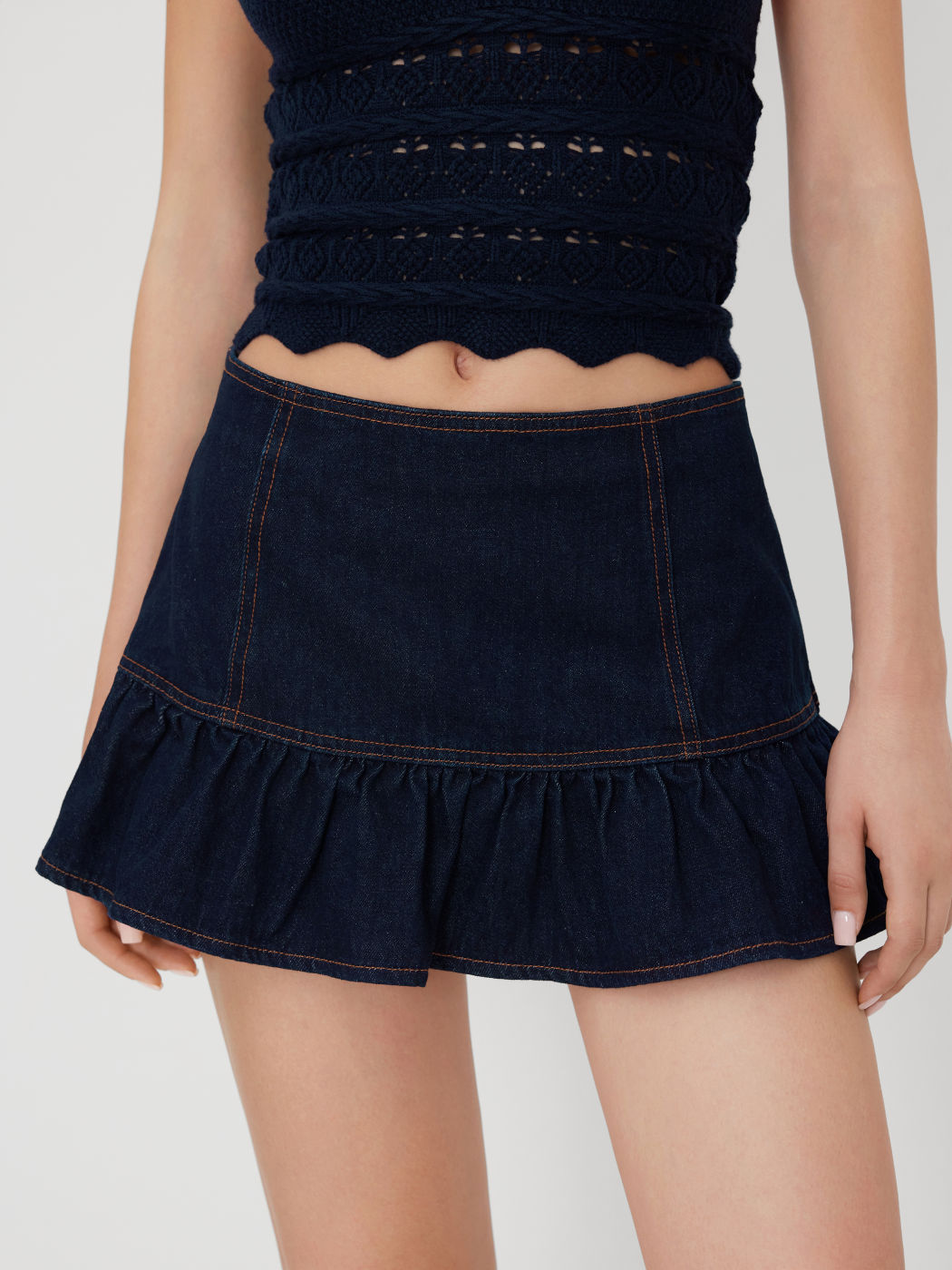 Stretch Denim Low Rise Ruffle Hem Micro Mini Skirt