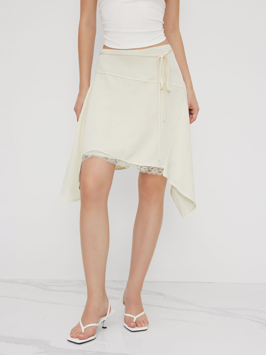 Mid Rise Asymmetrical Hem Lace Trim Knotted Midi Skirt