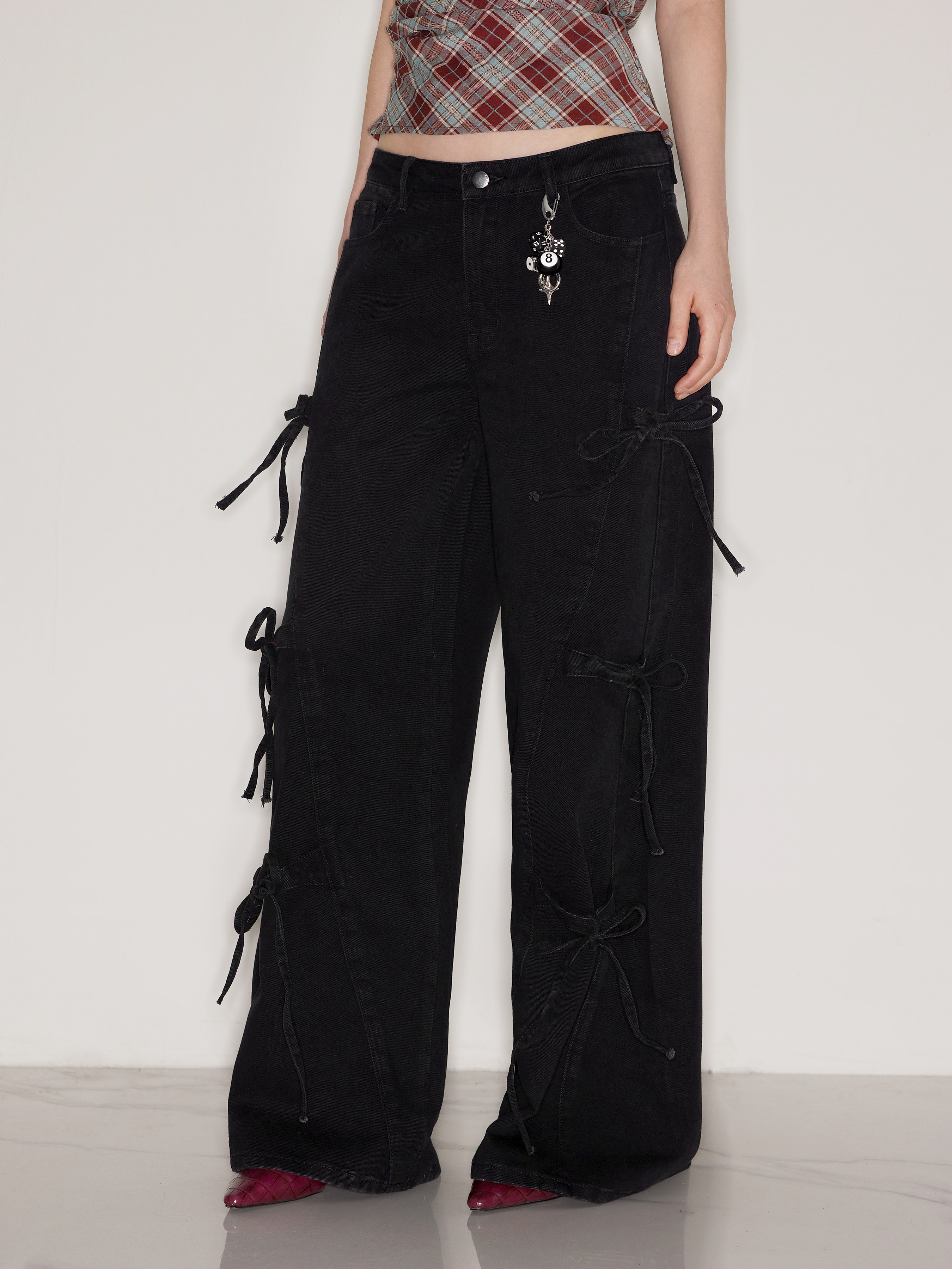 Denim Jeans in denim a vita bassa con nodo a fiocco e gamba larga