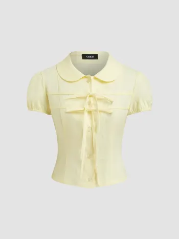 100% Baumwolle Bluse mit Peter-Pan-Kragen und Schleifenknopf an den Puffärmeln