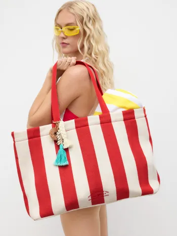 Was am Strand passiert, bleibt im Sand - Streifen-Tasche