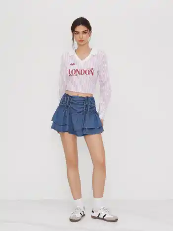 Mini gonna in denim a strati con coulisse a vita media