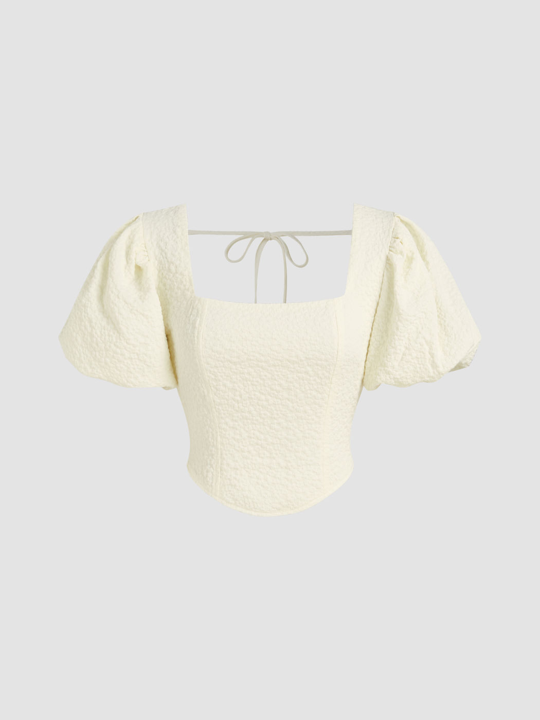Blusa a maniche a sbuffo testurizzata con scollo quadrato e orlo curvo