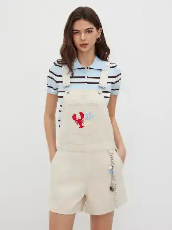 Jeans-Romper mit Hummer- und Stern-Applikationen und Anhänger