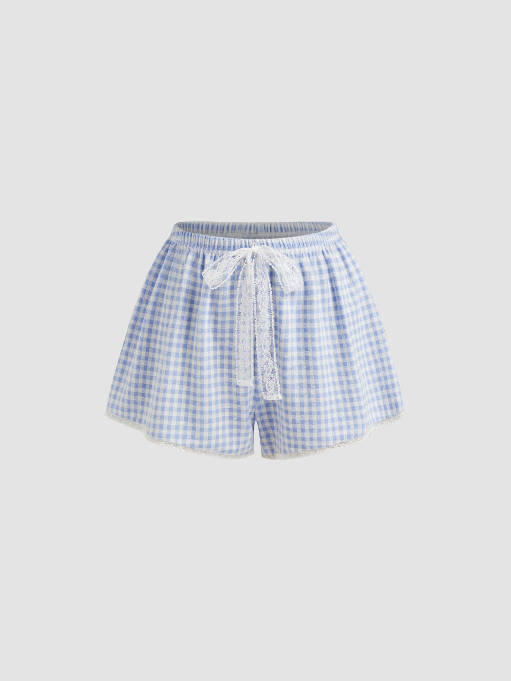 Shorts a quadri a vita bassa con fiocco e rifiniture in pizzo