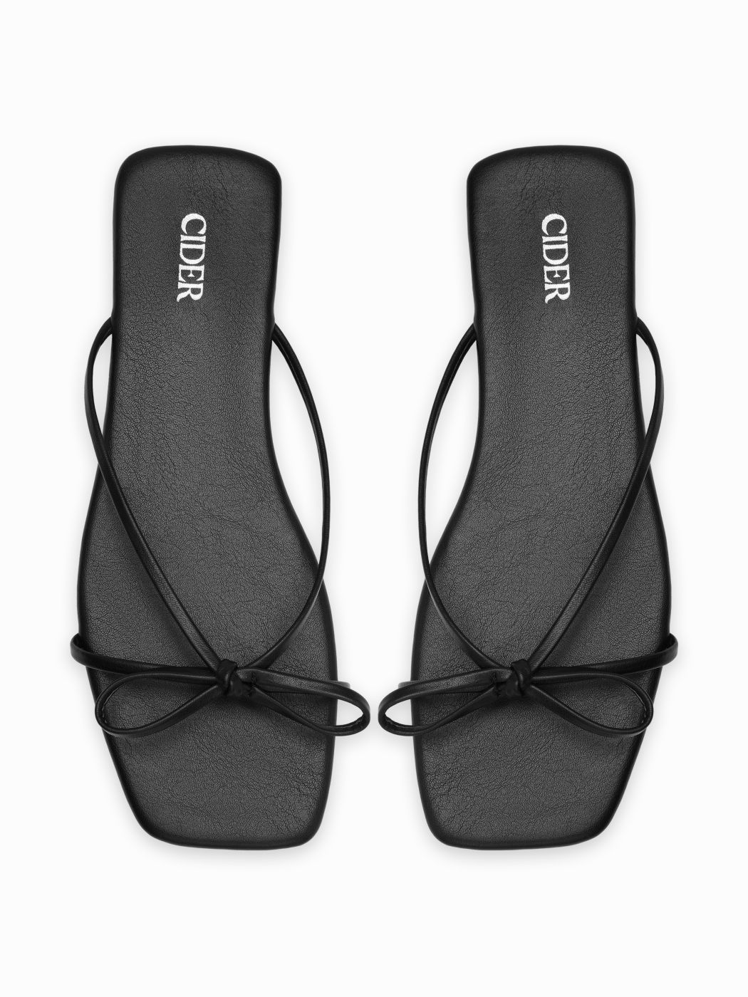 BOWKNOT FAUX LEATHER SLIPPERS