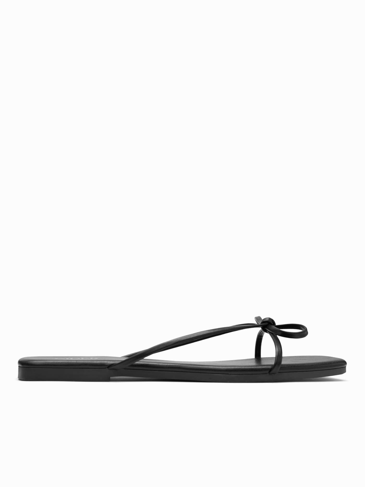 BOWKNOT FAUX LEATHER SLIPPERS