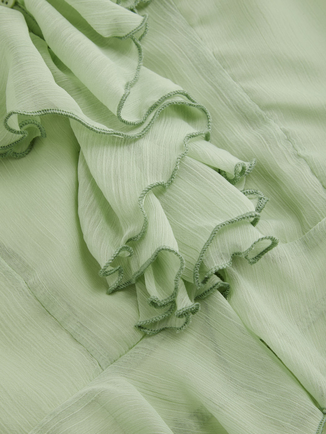 Camicetta in chiffon con scollo a V, volant e maniche a lanterna