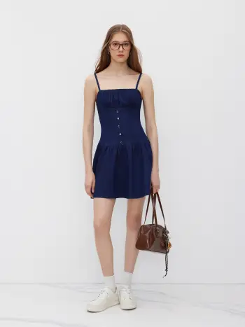 Mini abito in denim con bottoni e volant