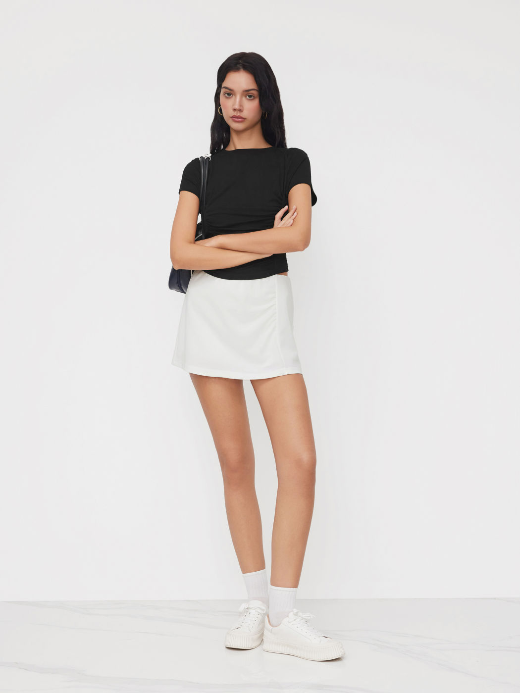 Skort mini con acanaladuras de bajo talla CDR
