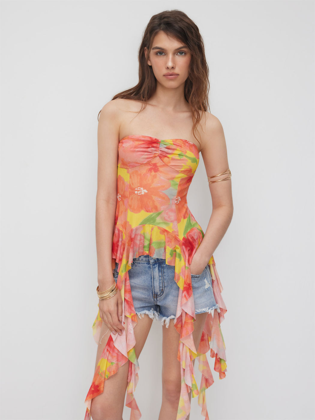 Top a fascia a rete con volant e orlo arricciato con fiori