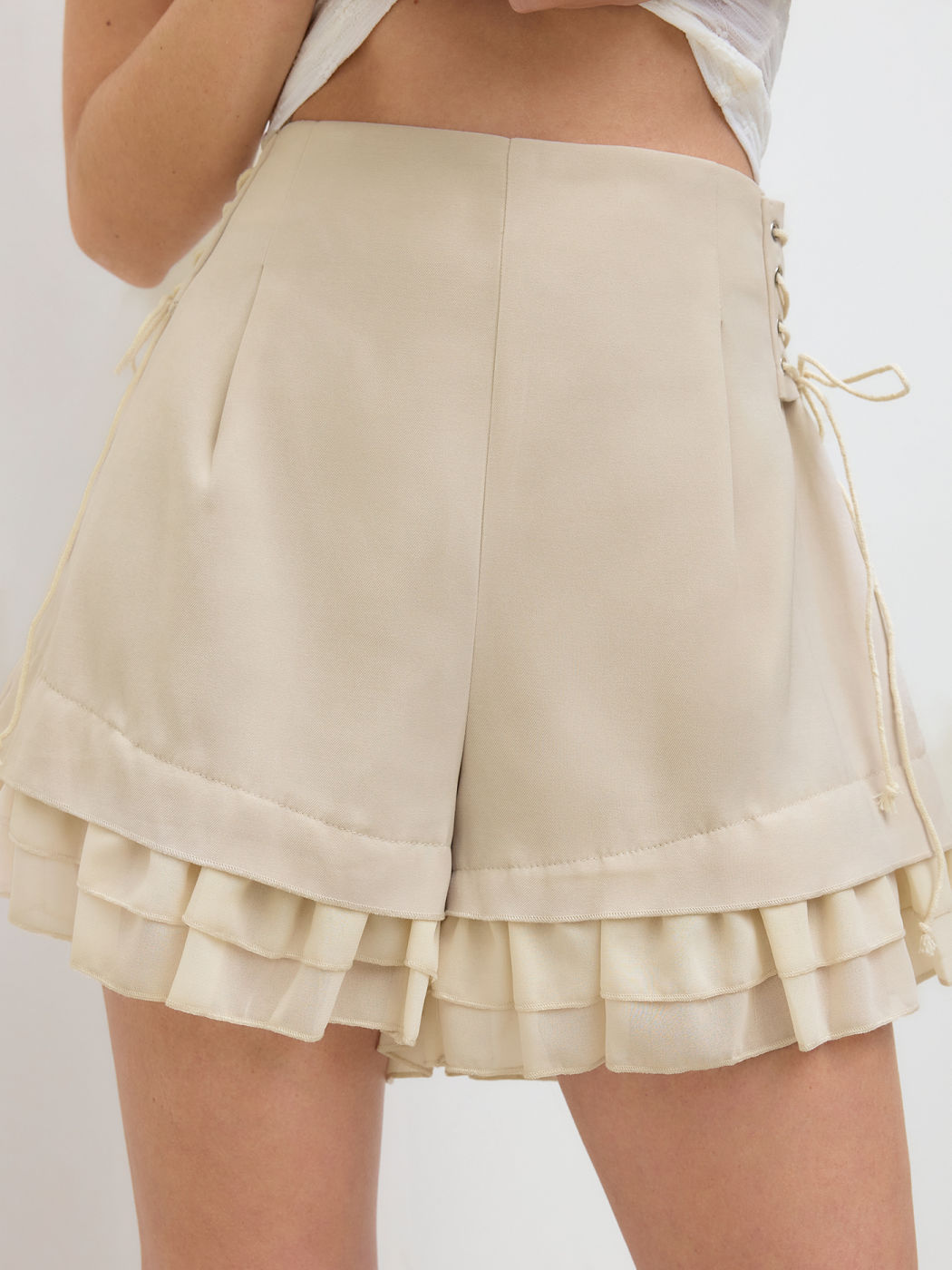 Ruffle Hem Lace Up Shorts