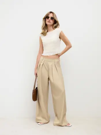 Pantaloni a vita alta a gamba larga con pieghe